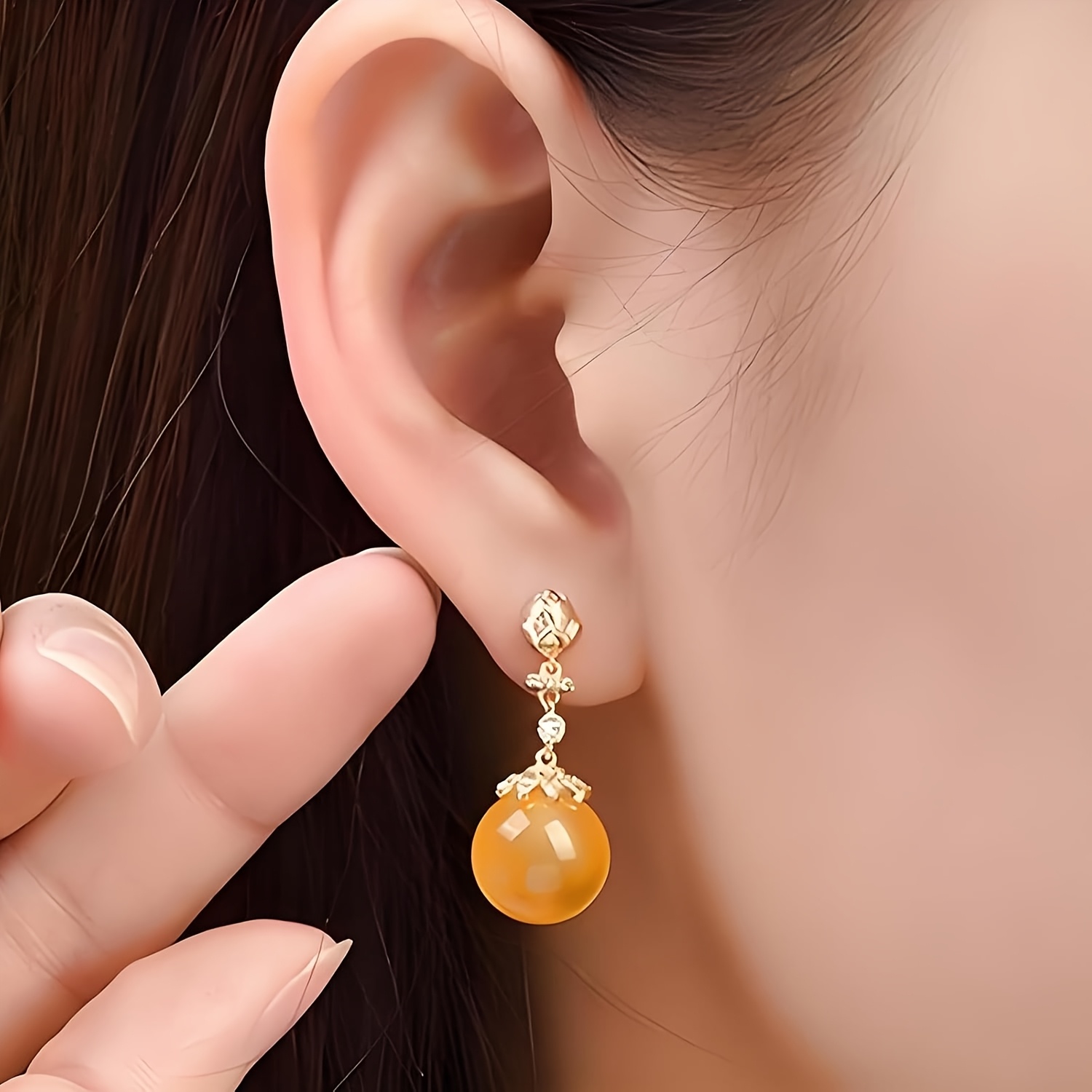Twee geperforeerde bolvormige  - Resin Art Jewellery recensie en prijs